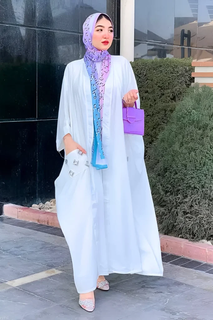 Elegant White Abaya with OmbrÃ© Purple Hijab Spring Hijab Outfit